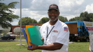 Charlotte plumbing company school supply drive