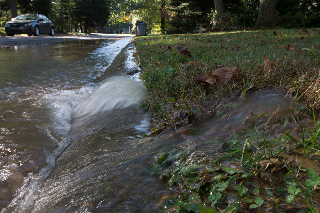 water main break Charlotte water pooling in yard
