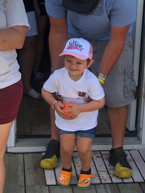 Happy child with a new playset