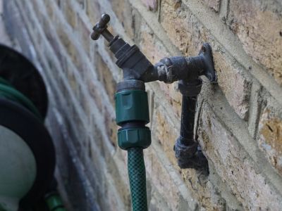 disconnect the hose from outdoor faucets